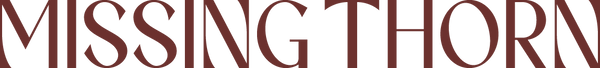 Text 'MISSING THORN' in a stylized font on a plain background