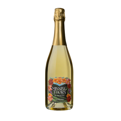 Bottle of Missing Thorn sparkling wine on a white background