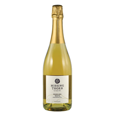 Bottle of Missing Thorn sparkling white wine on a white background
